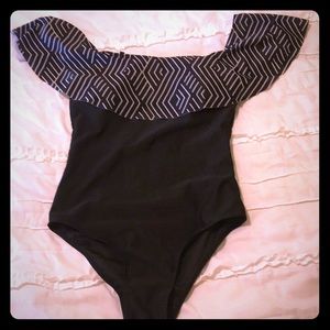 One piece ruffle top swim suit size M